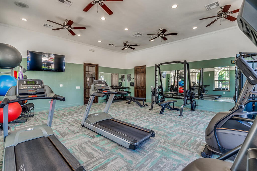 Fitness Center Cardio Equipment at The Dominion Apartments in Conroe TX