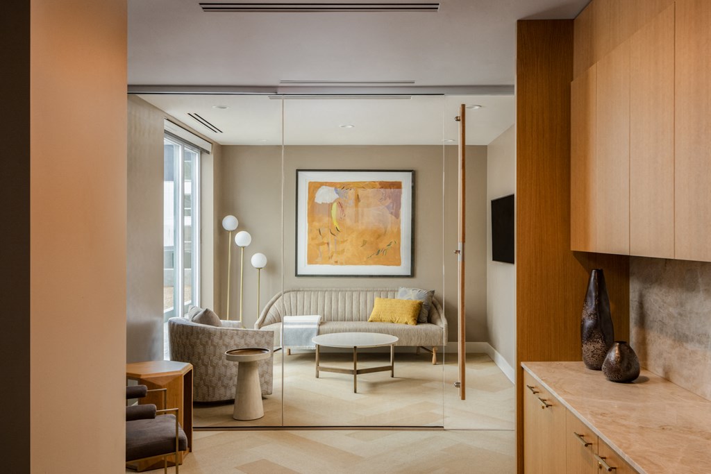 a living room with a couch and a table