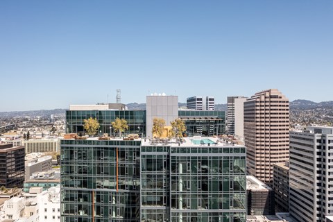 a view of a city skyline with tall buildings and skyscrapers