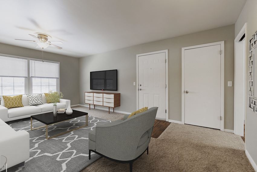 a living room with a couch and a chair