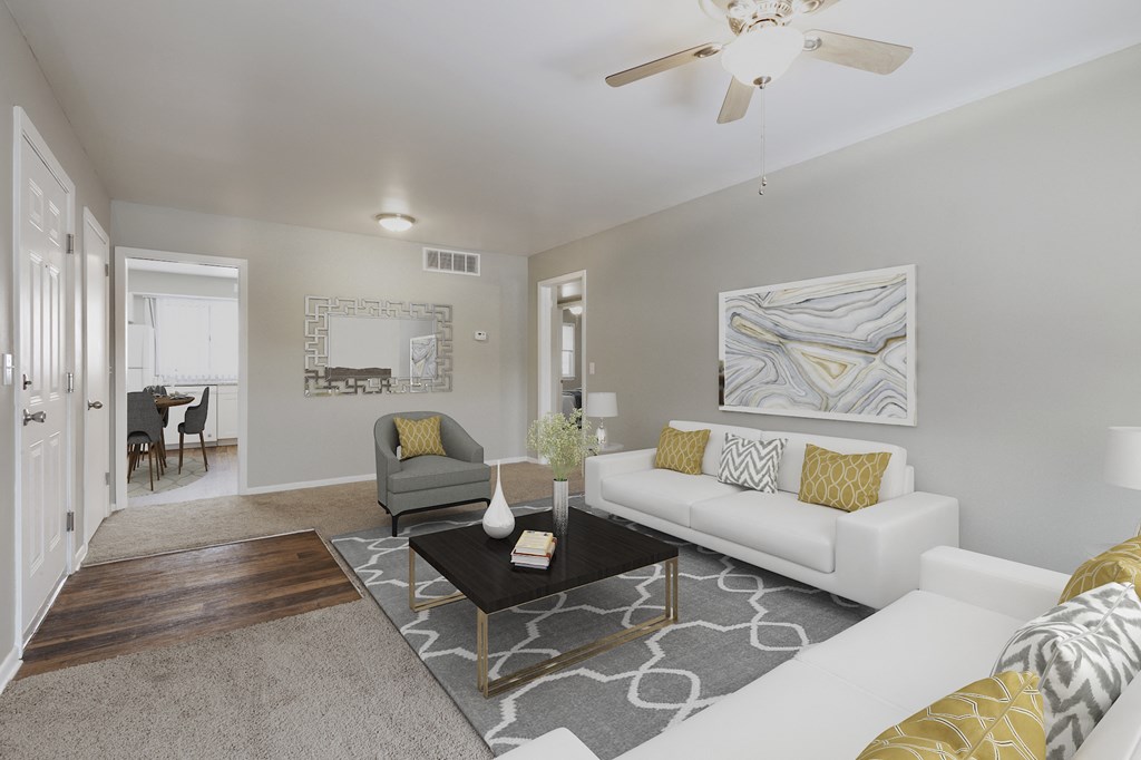 a living room with couches and a coffee table