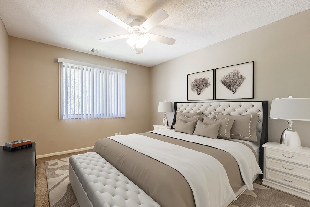 create a relaxing bedroom with a large bed and ceiling fan