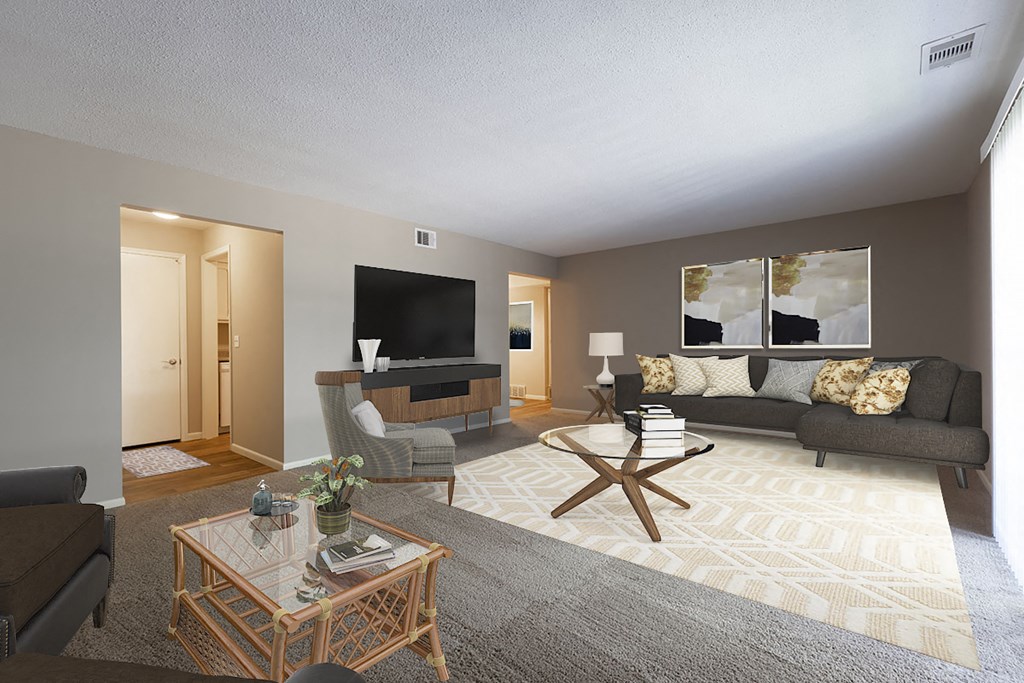 a living room with a couch and a television