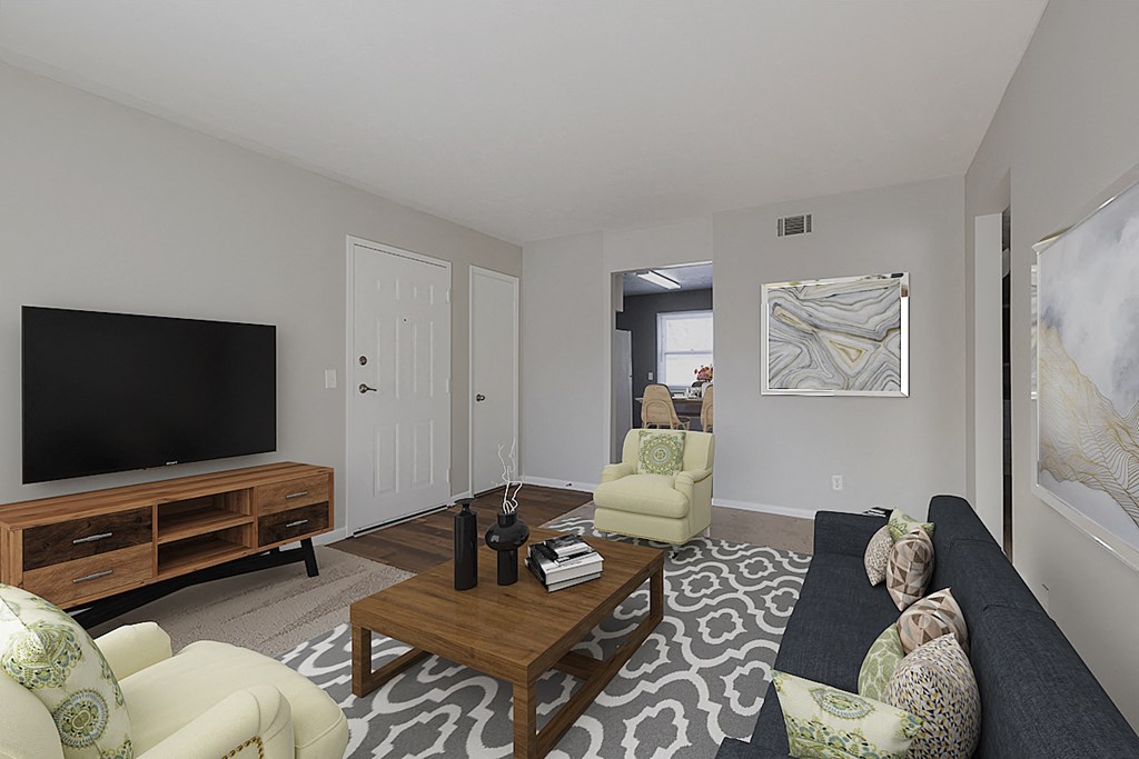 a living room with a couch and a tv