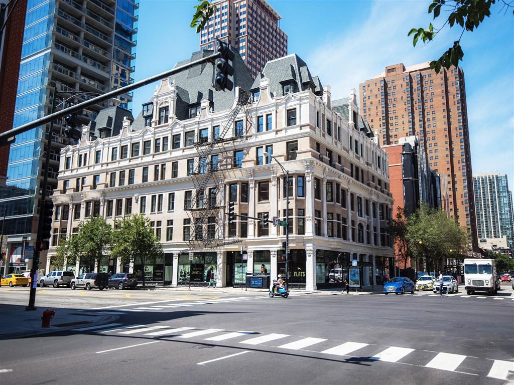 a building on the corner of a city street