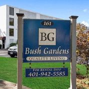 a blue sign is in front of a building