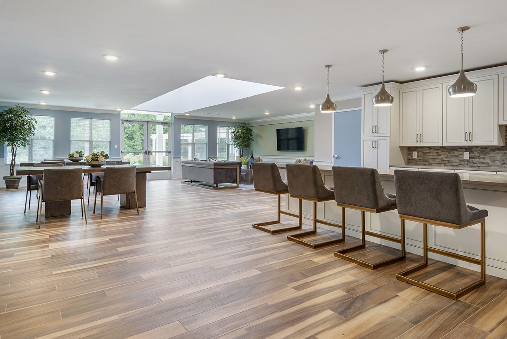 a living room with a dining room and a kitchen