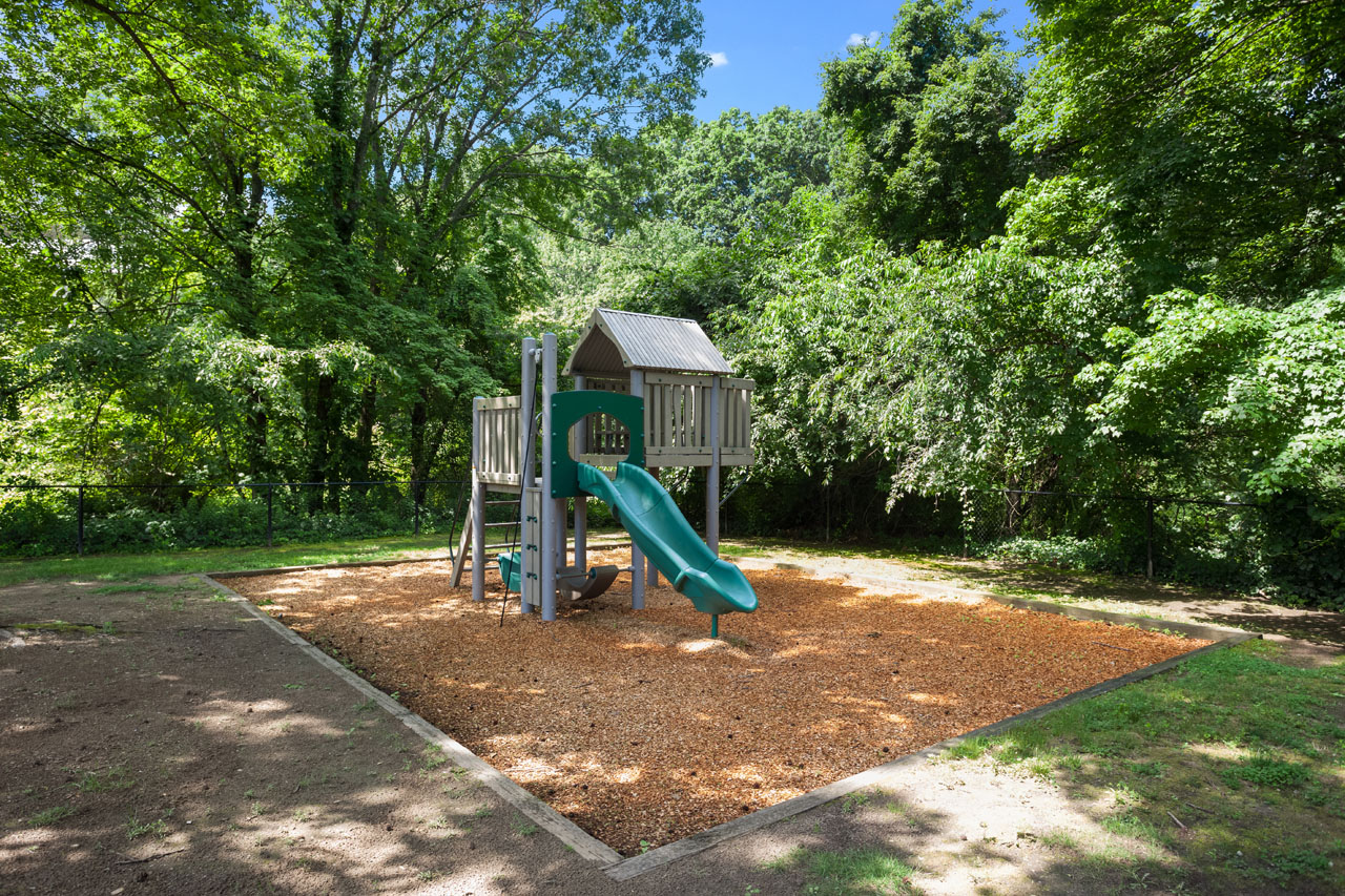 Playground with trees and slide