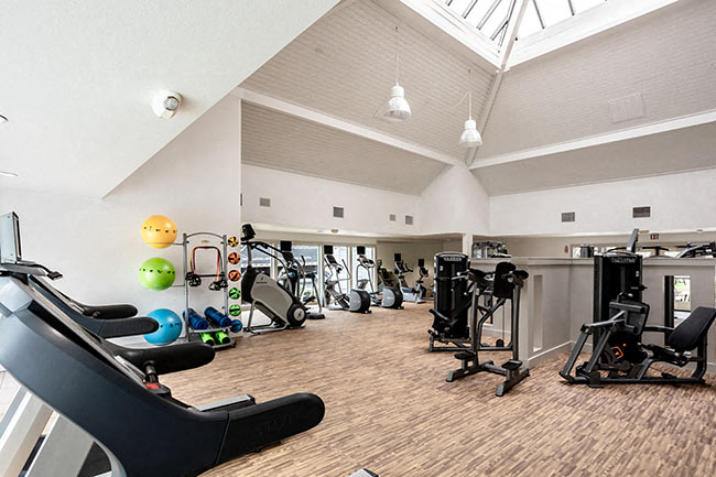 Fitness center with cardio and weight equipment l Tides at Grand Terrace