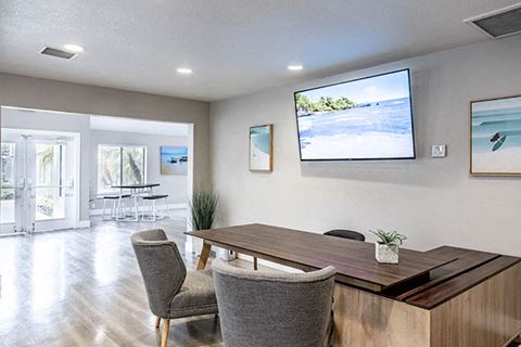 Leasing office desk and TV l Tides at Grand Terrace
