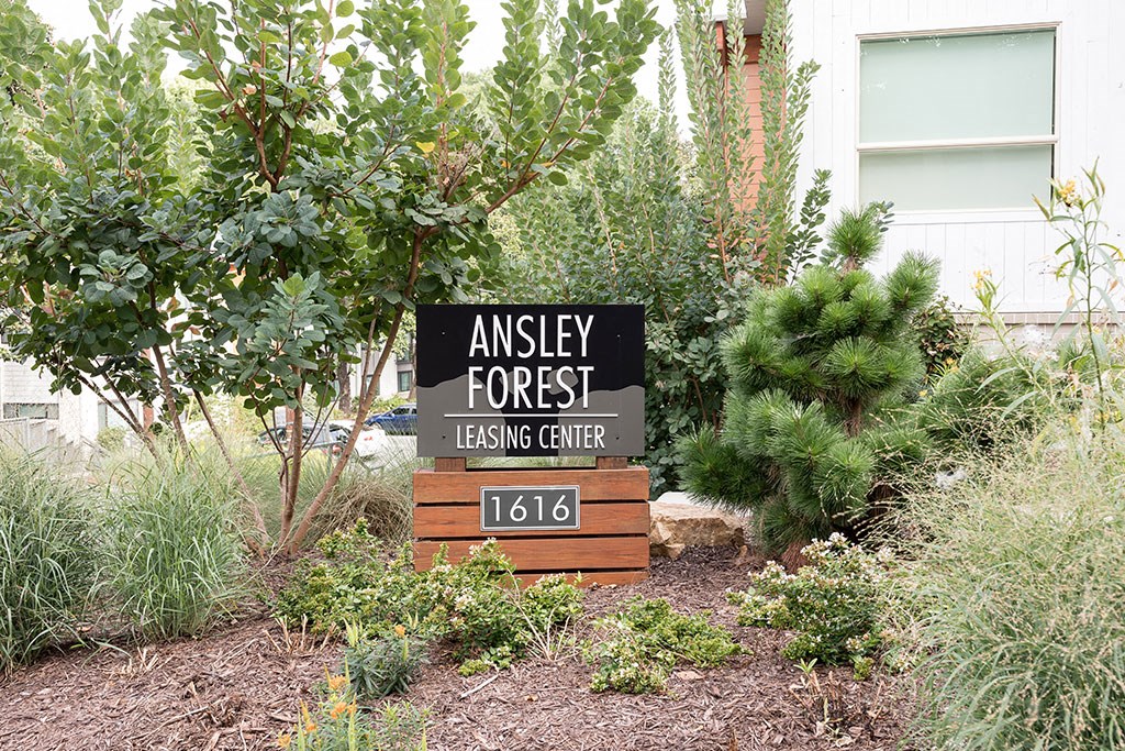 a sign in front of a building