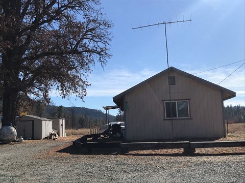 a small house with a antenna on top of it