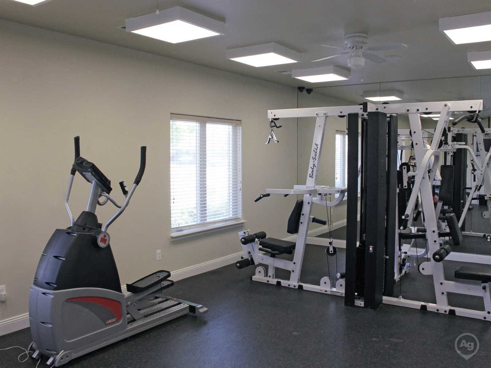 a gym with weights and other exercise equipment