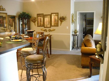 kitchen and living room area in open layout home - Photo Gallery 8