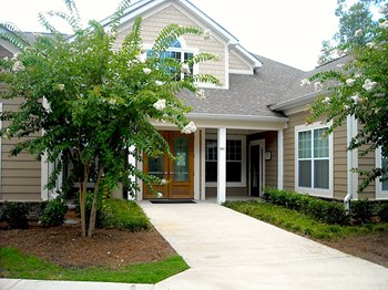 leasing office and clubhouse exterior with crepe myrtles - Photo Gallery 2