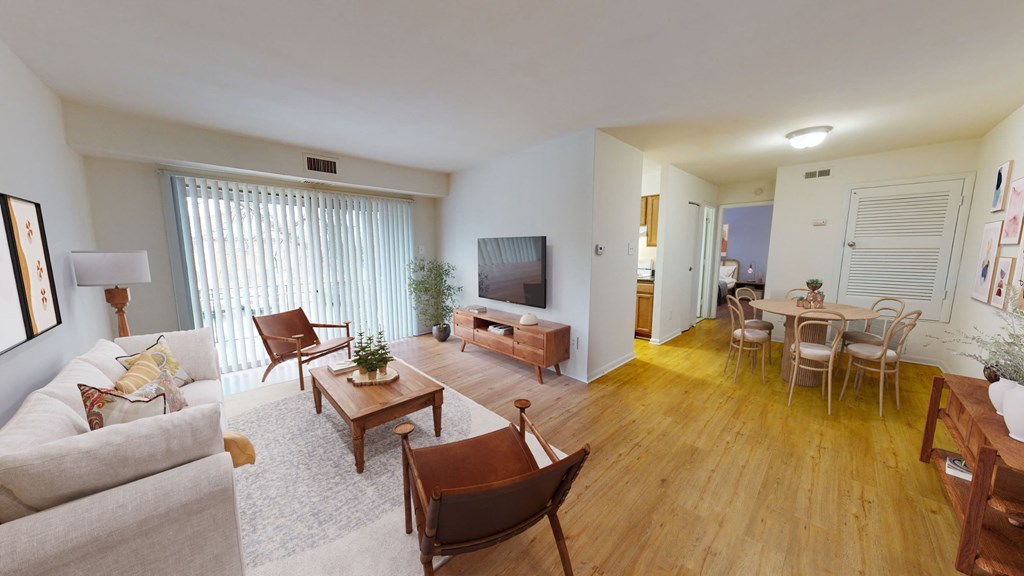 a living room with a couch and a tv