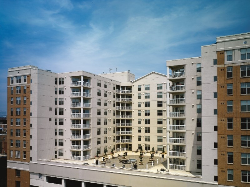 a view of a large apartment building from a balcony