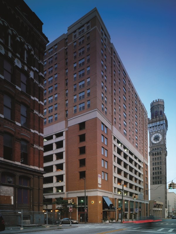 a tall building with a clock tower on the side of it