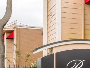 a large sign in front of a building