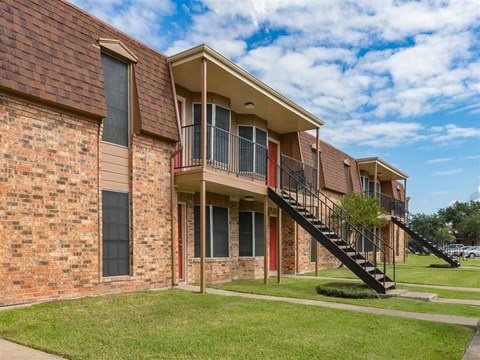 our apartments feature a spacious living area and a balcony