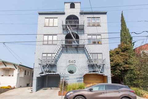 A grey building with the number 640 on it.