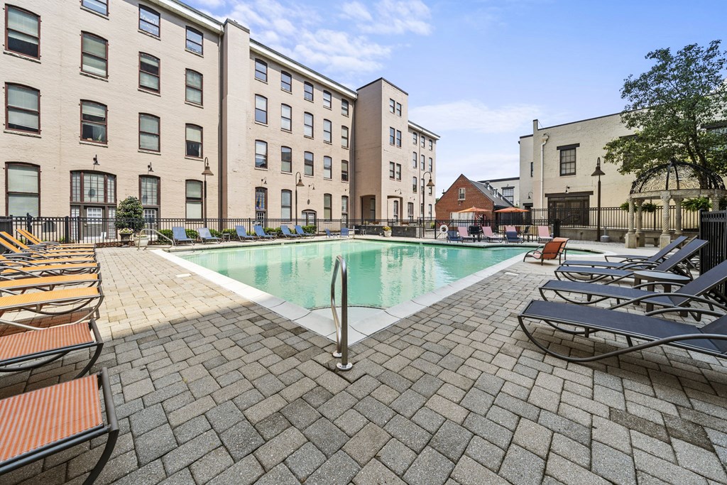 our apartments have a large pool and lounge chairs