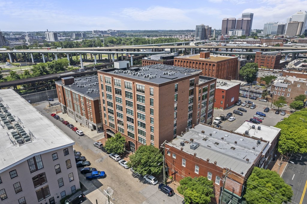 an aerial view of an apartment building in the city