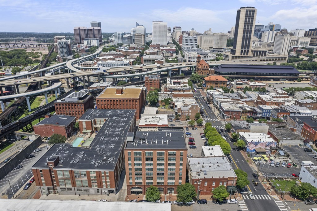 an aerial view of the city with the city skyline in the background