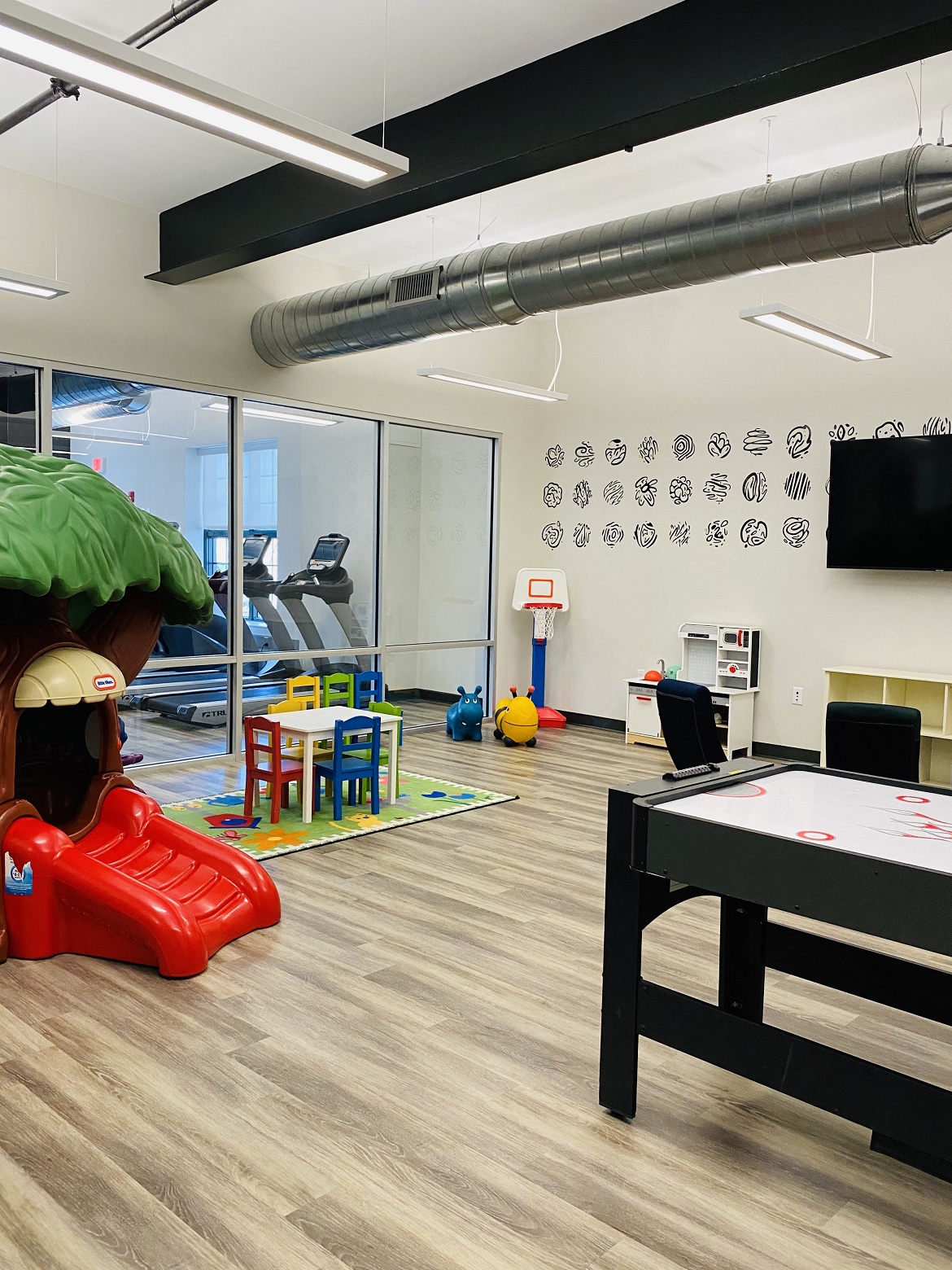 a games room with a ping pong table and a pool table