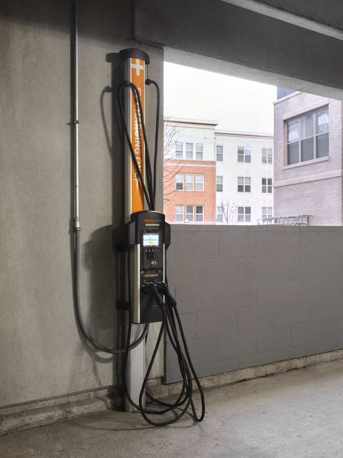 a gas pump is plugged into the wall of a building