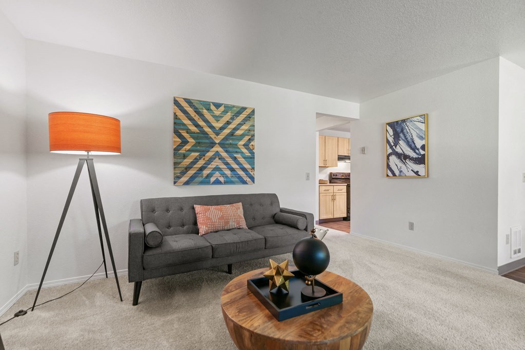 a living room with a couch and a coffee table
