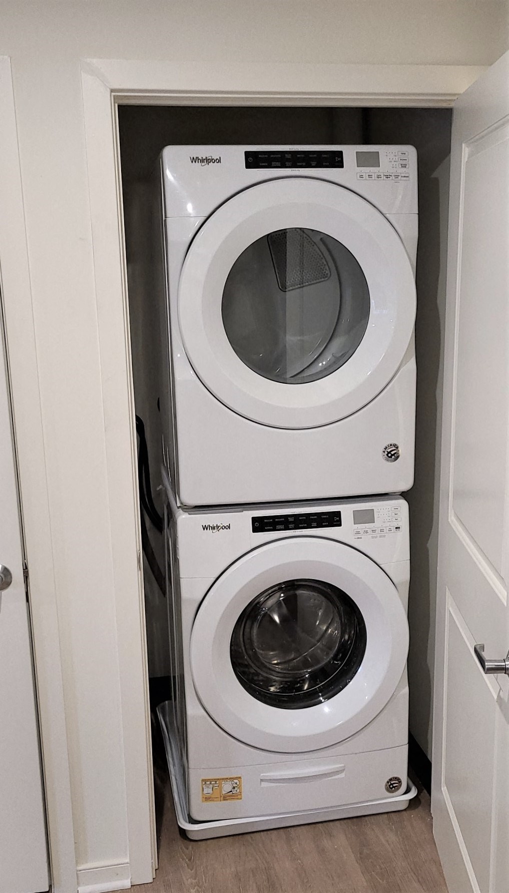 a washing machine and dryer in a small closet