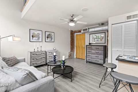 a living room with a couch and a table