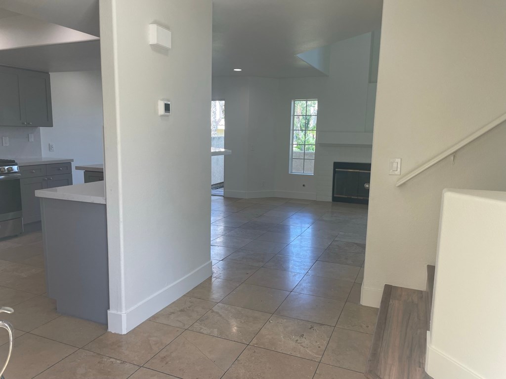 a view of the kitchen and living room from the family room