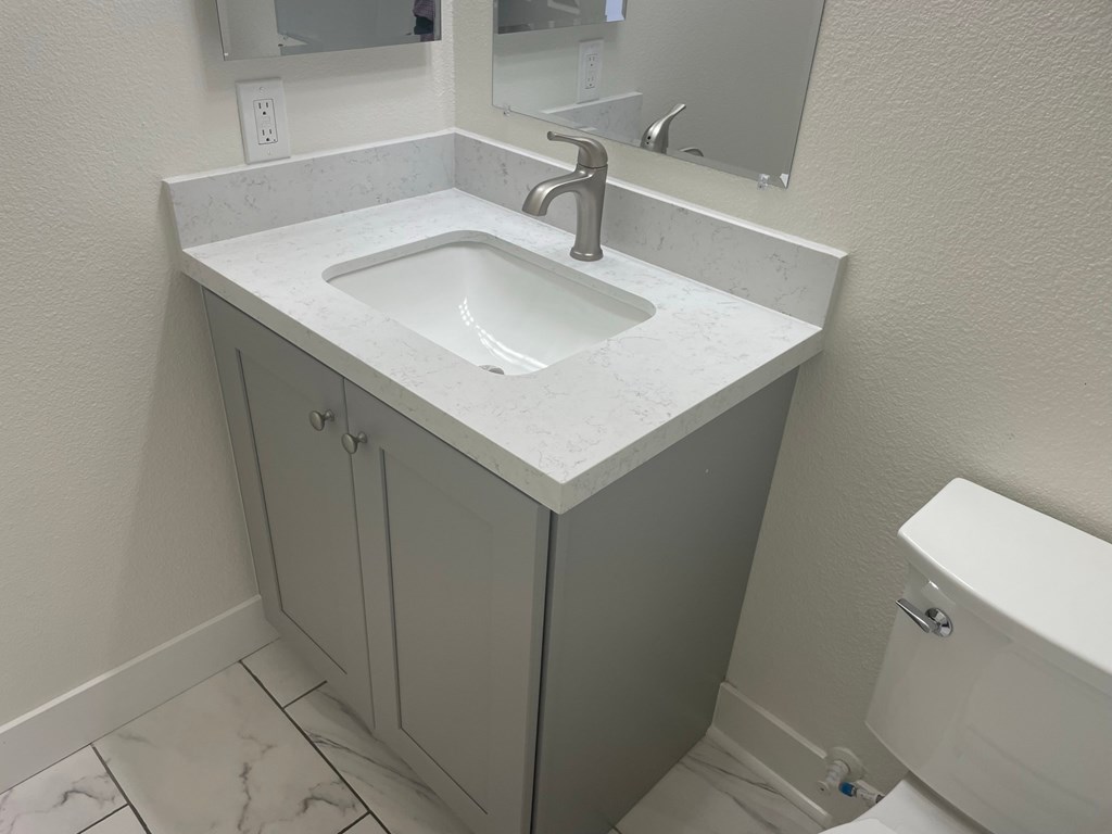 a small bathroom with a sink and a toilet