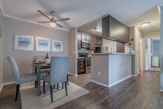 Living room and dining room view at Monterra Ridge Apartments, Canyon Country, California - Photo Gallery 3