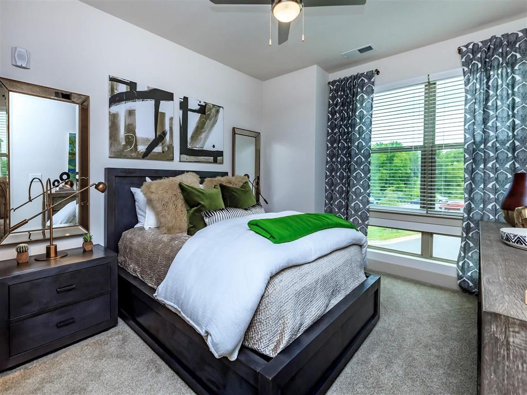 Spacious Berewick Pointe Bedroom With Comfortable Bed in Charlotte, NC Apartment Homes for Rent
