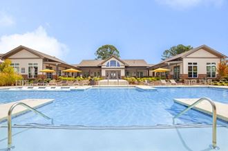 Resort Style One White Oak Swimming Pool with Aqua Sundeck in Cumming Apartments