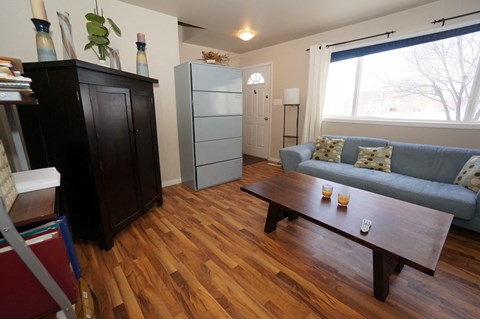 a living room with a couch and a coffee table