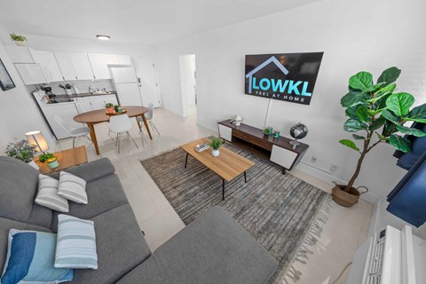 a living room with a couch and a table