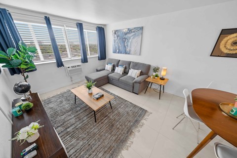 a living room with a couch and a table