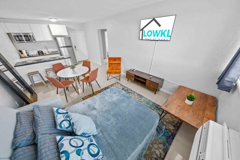 a living room with a couch and a table