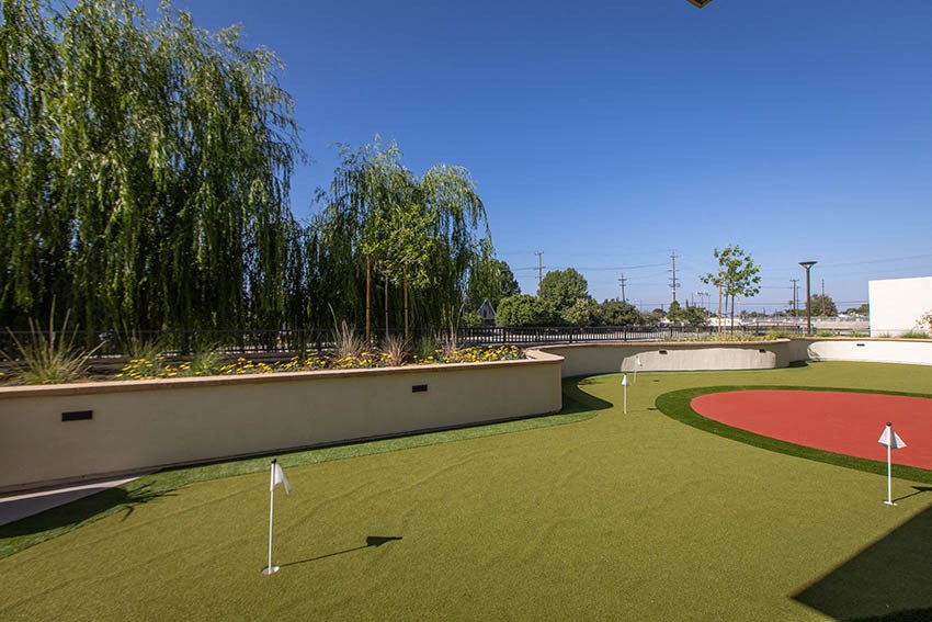 a golf course is shown in the backyard of a house