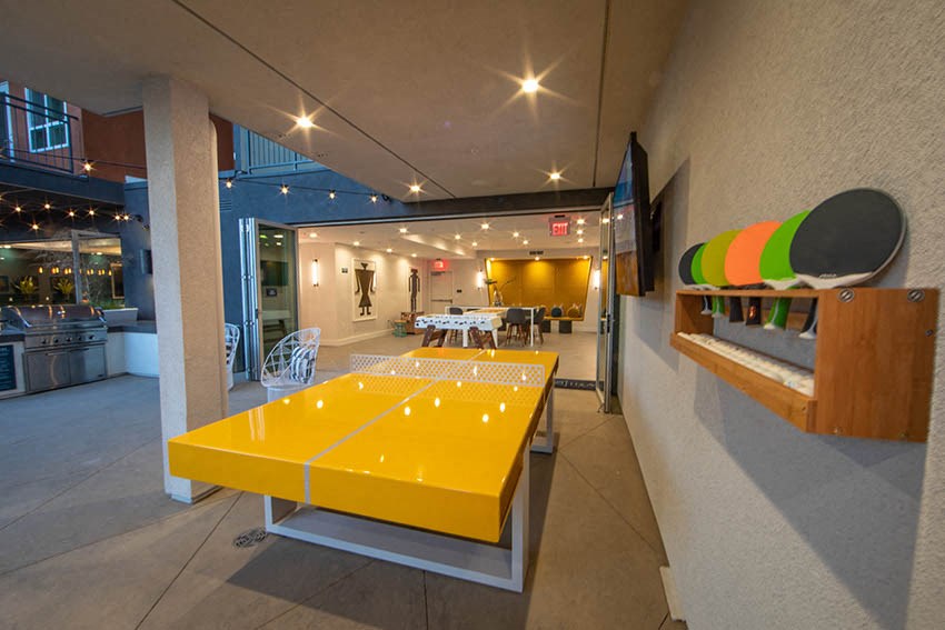 a ping pong table in the middle of a room