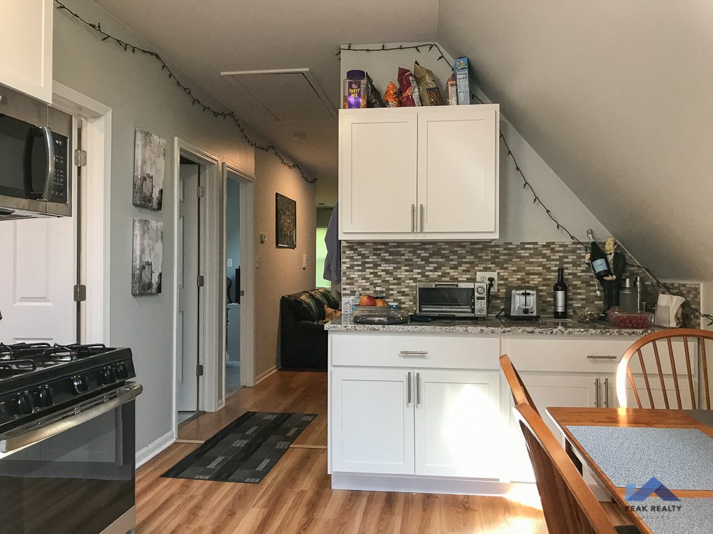a view of the kitchen from the living room
