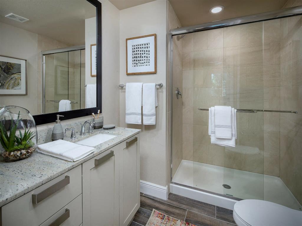 separate glass enclosed shower