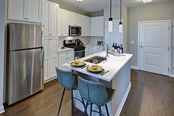 Well Equipped Kitchen And Dining Well Equipped Kitchen And Dining at Marq on Main, Lisle, Illinois - Photo Gallery 2
