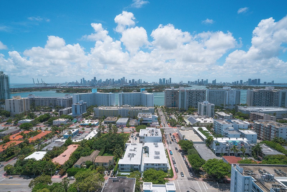 an aerial view of the city with the city skyline in the background
