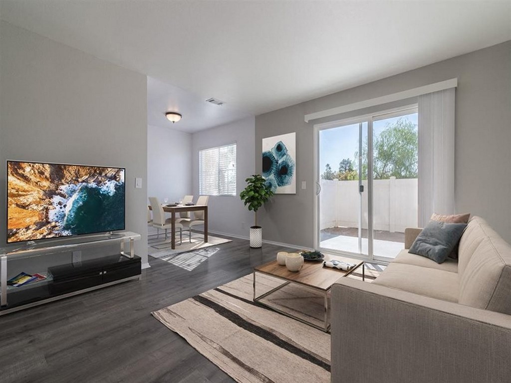 a living room with a couch and a tv