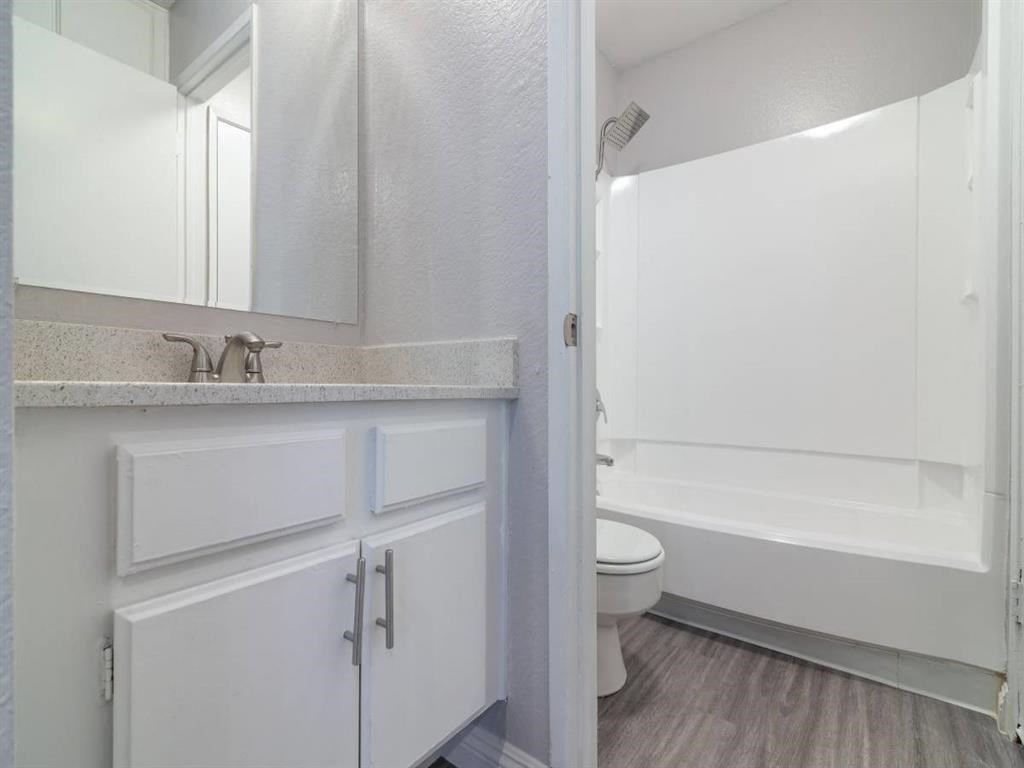 a bathroom with a sink and a toilet